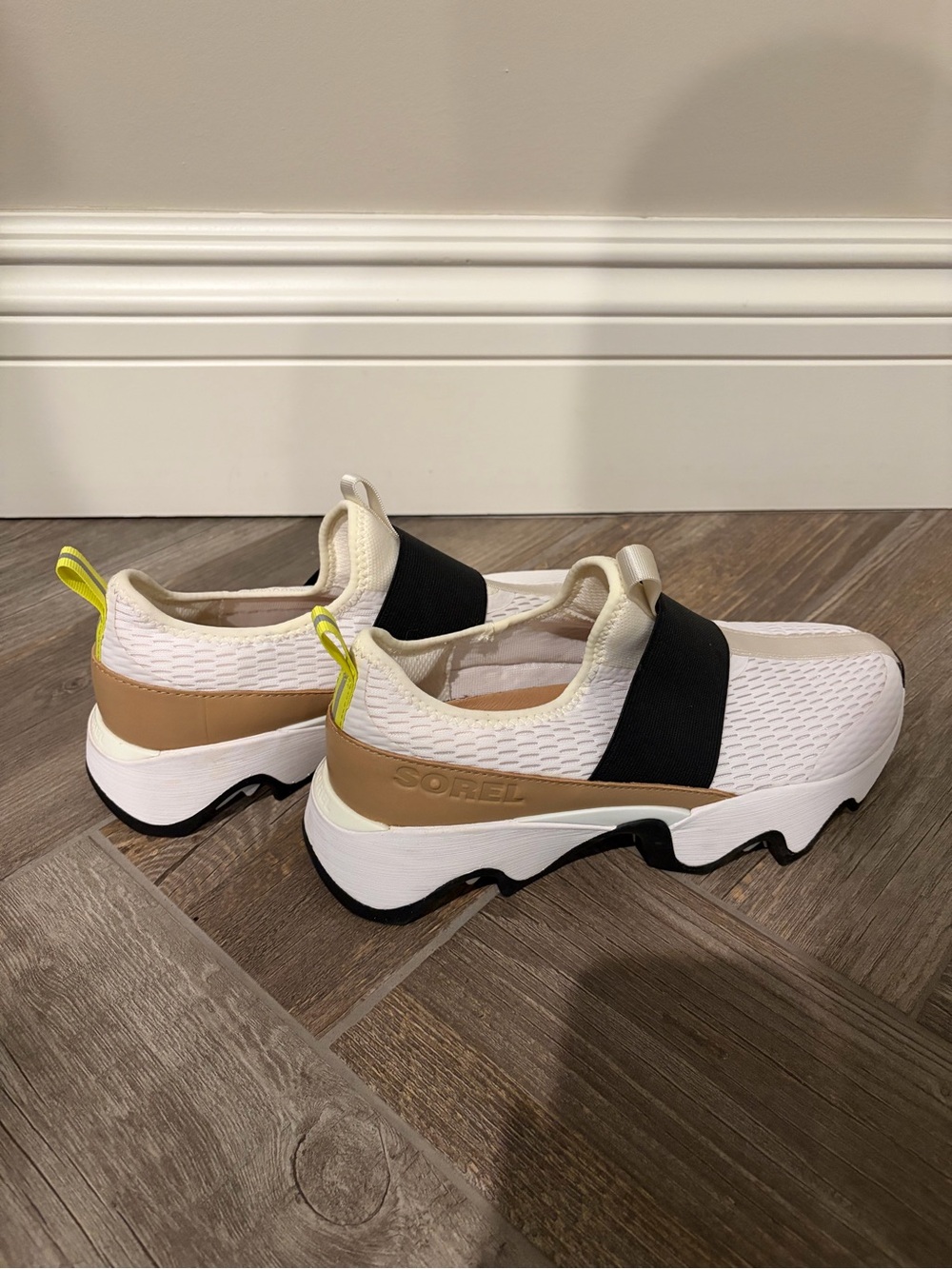 Sorel Women's White Mesh Slip-On Sneakers with Tan Accents and Black Strap